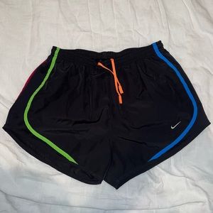 Black with multicolored lining Womens Nike running shorts. Size medium